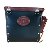 Black leather pouch with brown accents and a brand logo on a white background